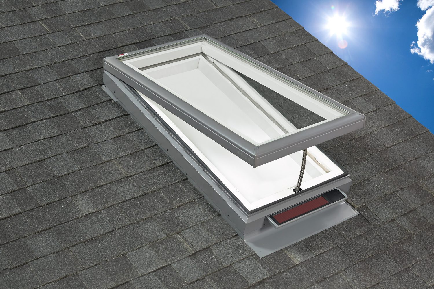 Velux skylights installed on a grey tiled roof